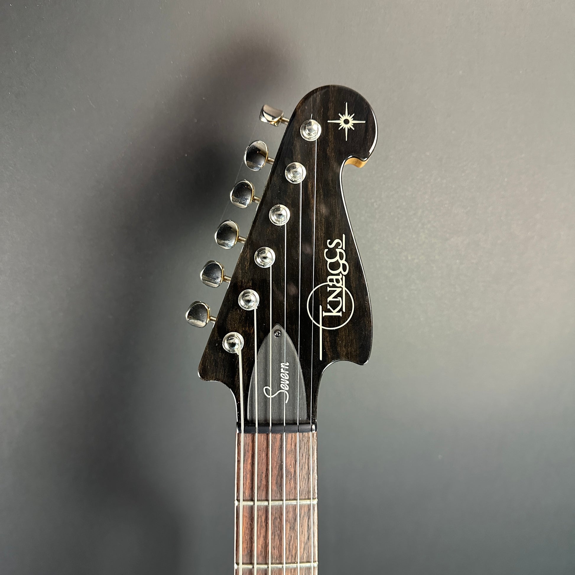 Front of headstock of Used Knaggs Severn Trem SSS Sunflower.