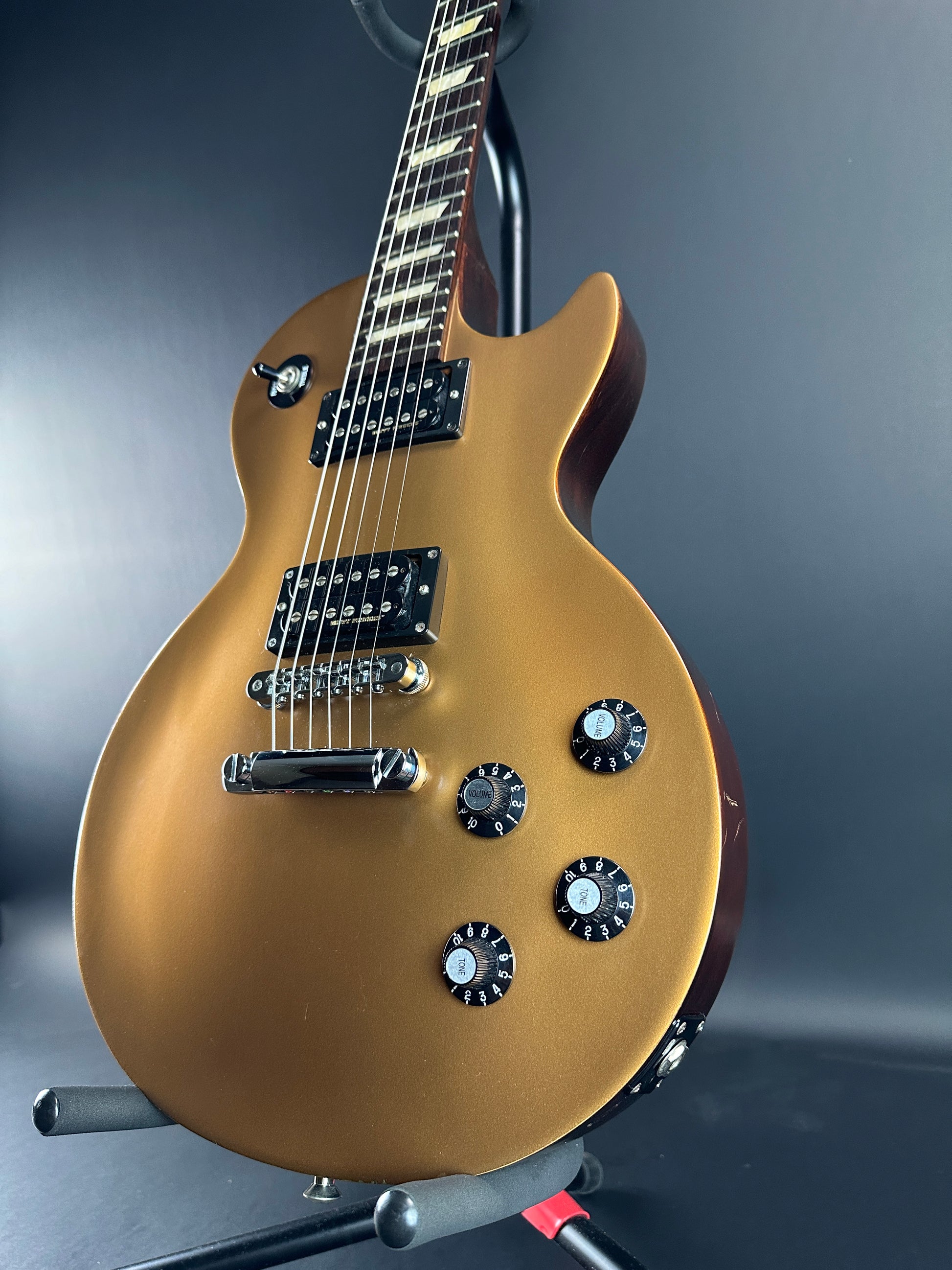 Front angle of Used Gibson Les Paul 70's Tribute Gold Top.