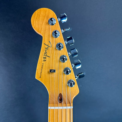 Front of headstock of Used Fender American Ultra Stratocaster Left Hand Cobra Blue.