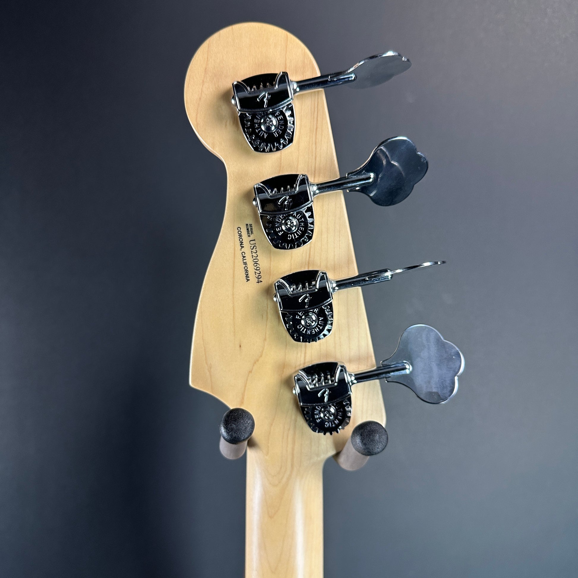 Back of headstock of Used 2013 Fender American Performer P Bass Sunburst.