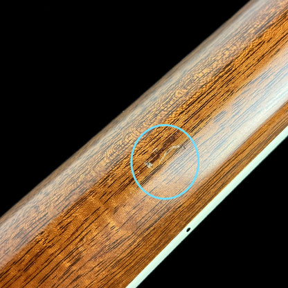 Damage on back of neck of Used Taylor 814ce Natural.