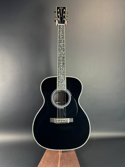 Full front of Martin Custom Shop Black OM-45 Tree of Life Sitka/EIR.