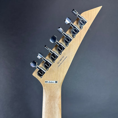 Back of headstock of Used Jackson Pro Series SL7 Ebony Fretboard Gloss Black.