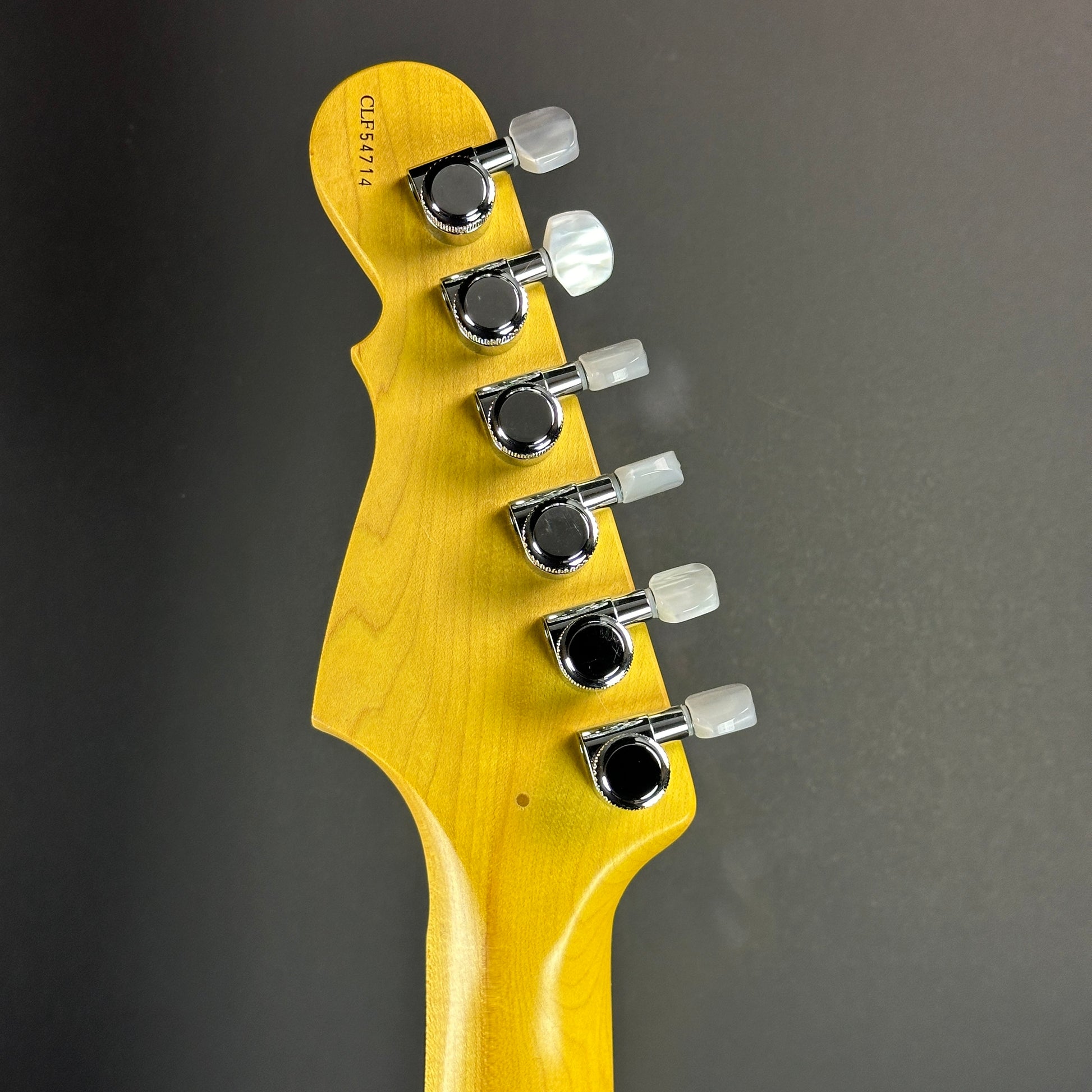 Back of headstock of Used G&L Legacy HSS Quilt Top.