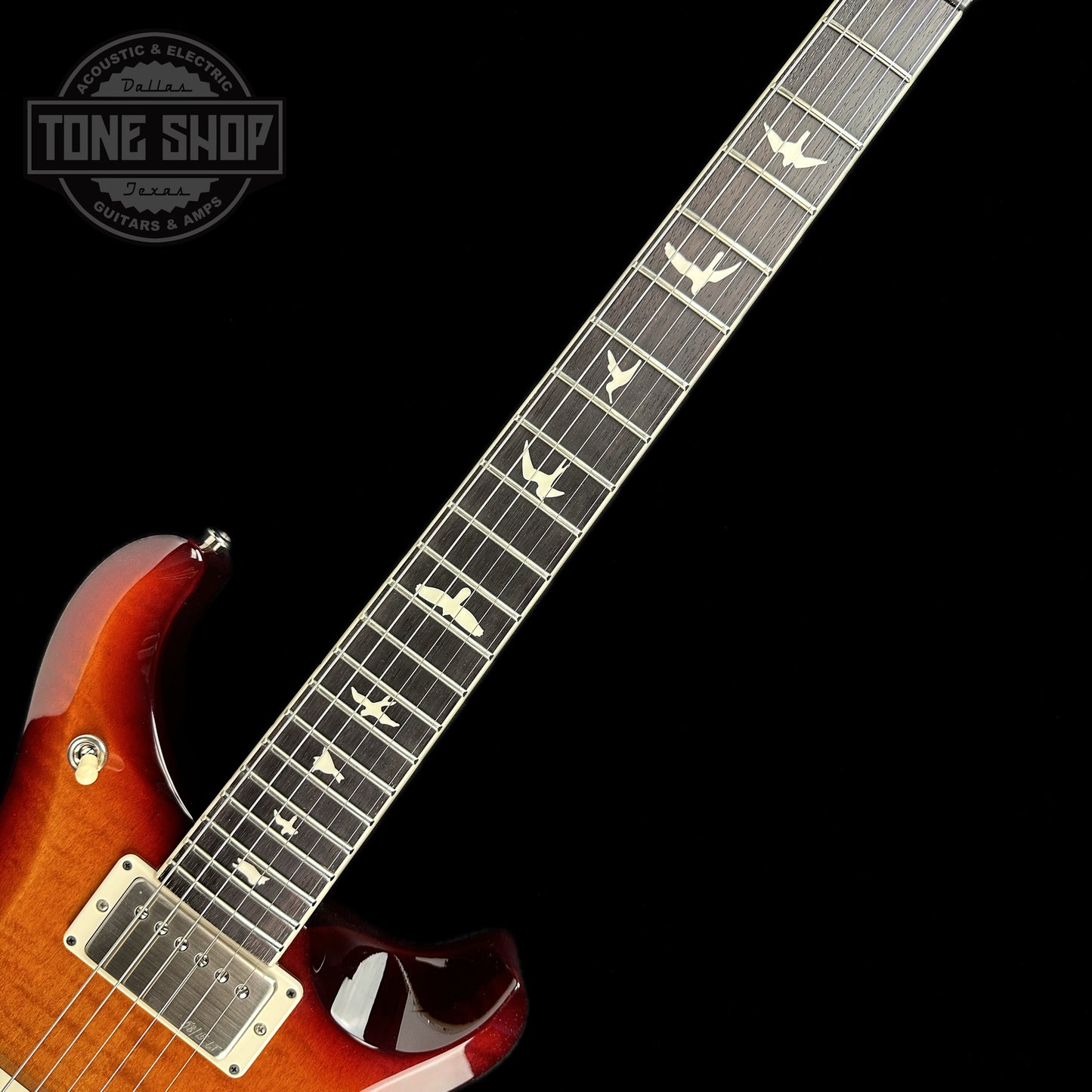 Fretboard of PRS S2 McCarty 594 2024 Spec TSG Flame Top Dark Cherry Sunburst.