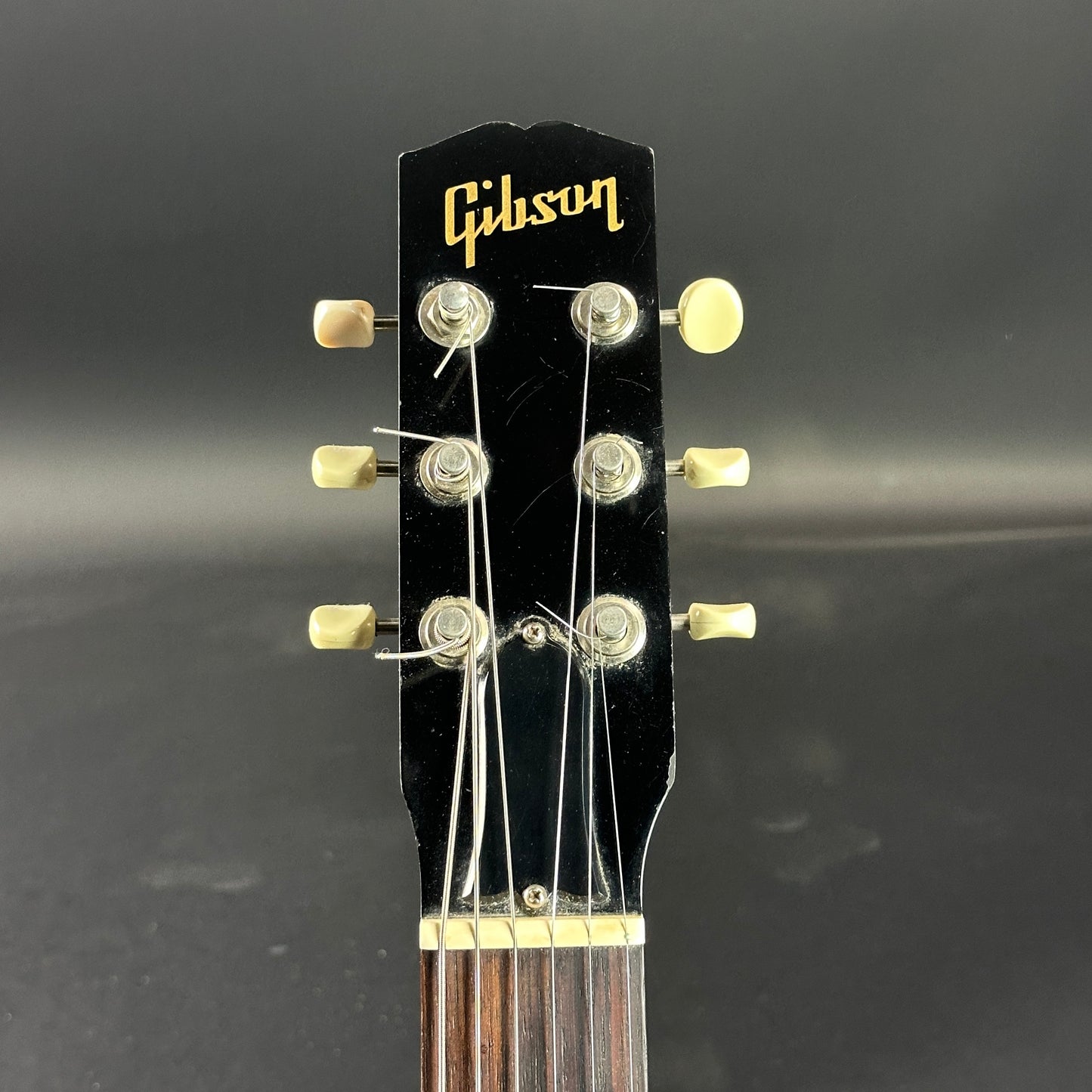 Front of headstock of Used Gibson Melody Maker Sunburst.