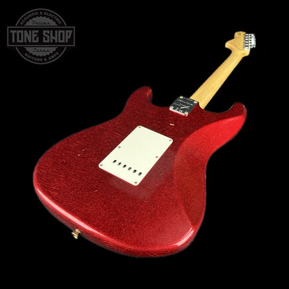 Back angle of Fender Custom Shop Limited Edition 69 Strat Journeyman Relic Aged Red Sparkle.