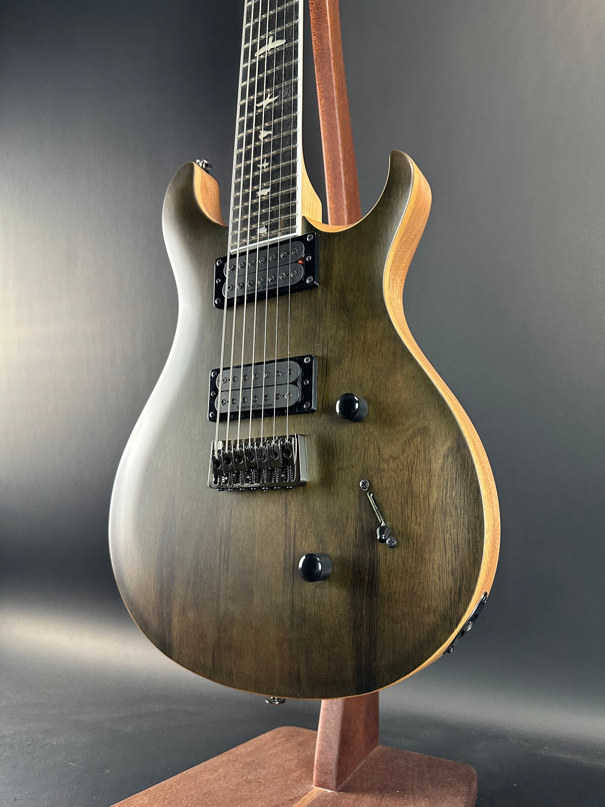 Front angle of Used PRS SE Mark Holcomb SVN Satin Walnut.