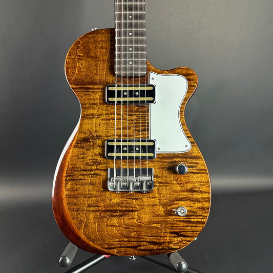 Front of Used Harmony Juno Transparent Brown Flame Maple.