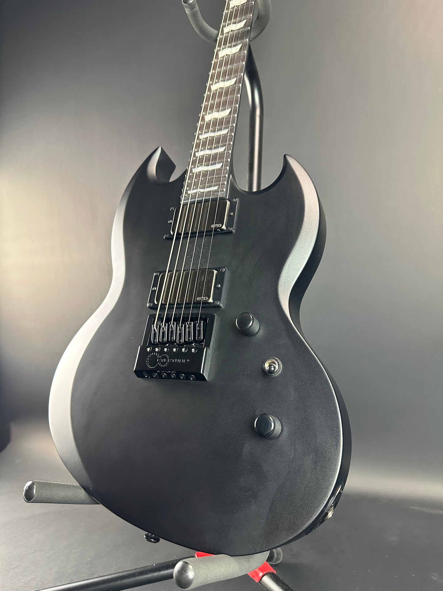 Front angle of Used ESP LTD Viper 1000 Deluxe Satin Black.