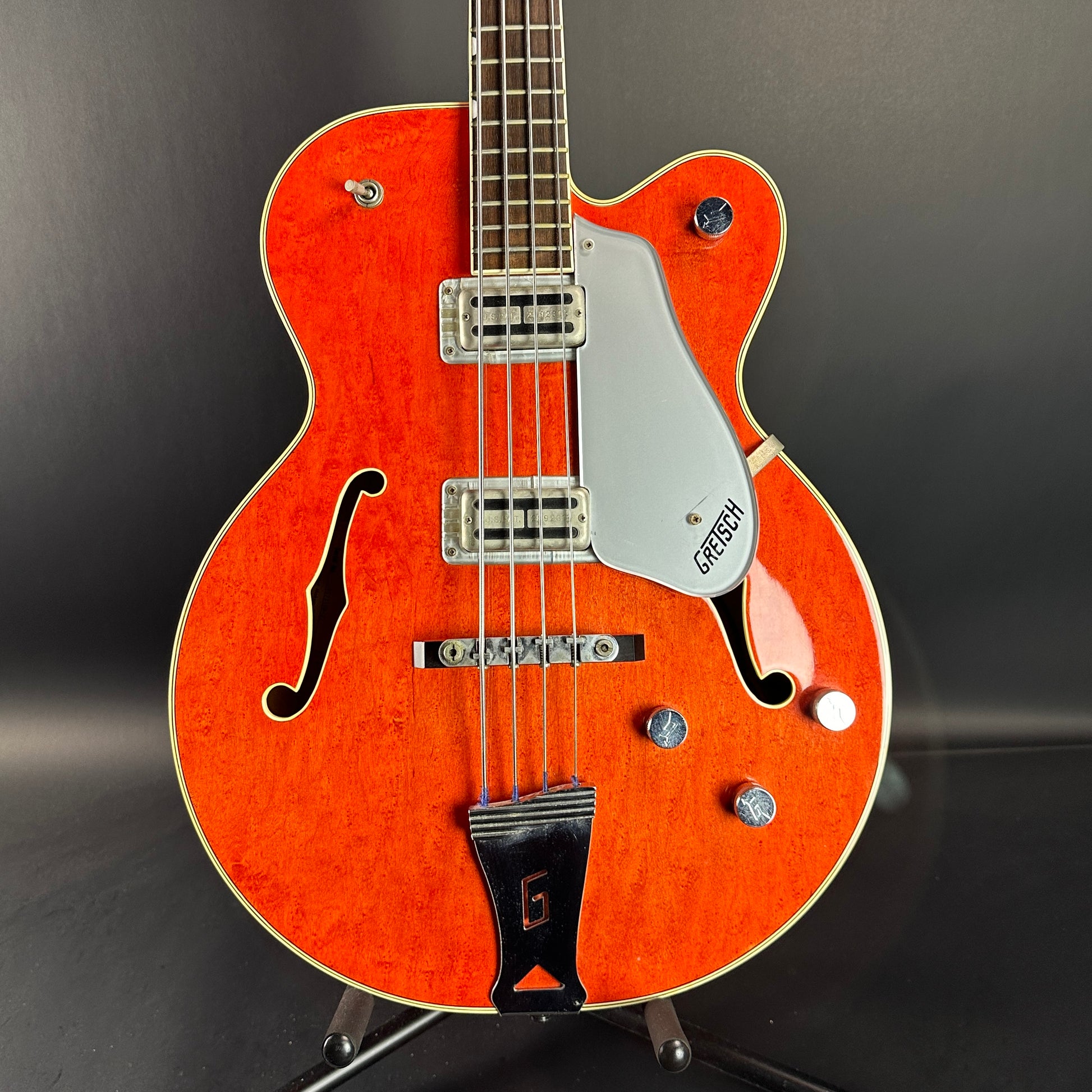 Front of Used 1991 Gretsch G6119B Broadcaster Bass Orange.