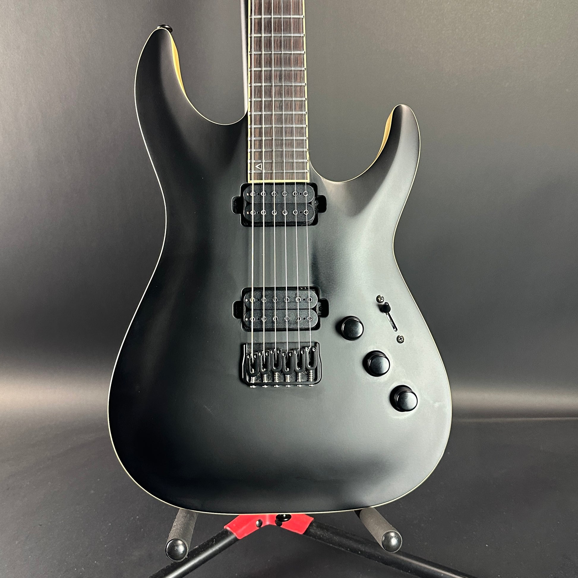 Front of Used Schecter C-1 Apocalypse Carbon Black.