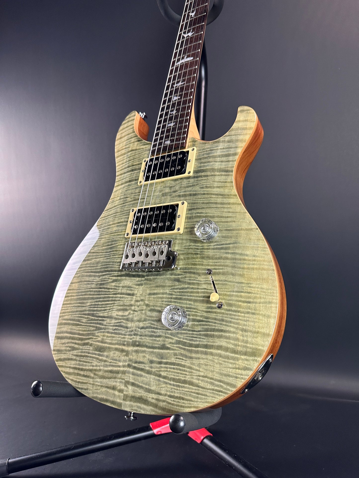 Front angle of Used PRS SE Custom 24 Trampas Green.