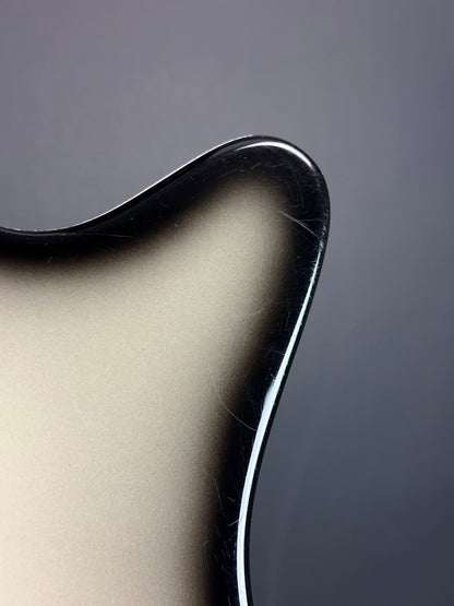 Scratches on back of Used Danelectro '59 DC Blackburst.