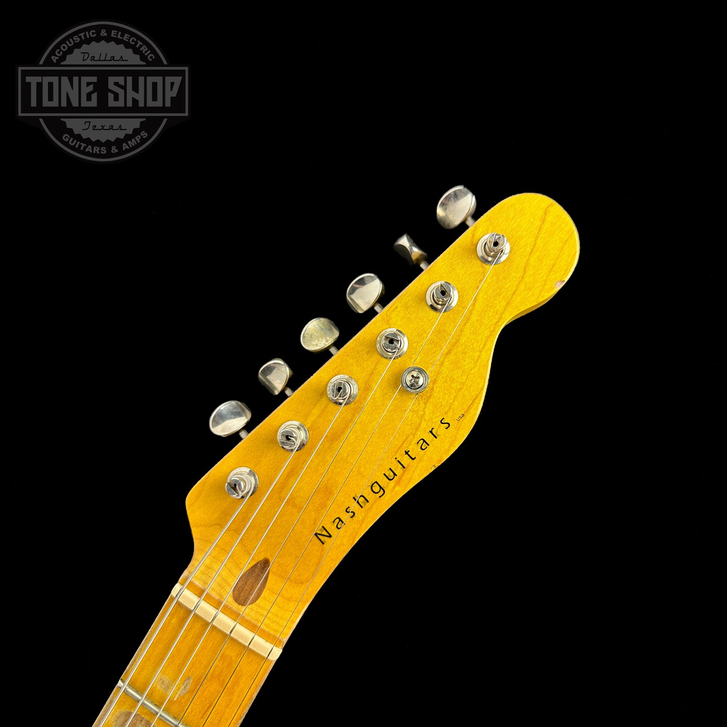 Front of headstock of Used Nash T-57 Surf Green.