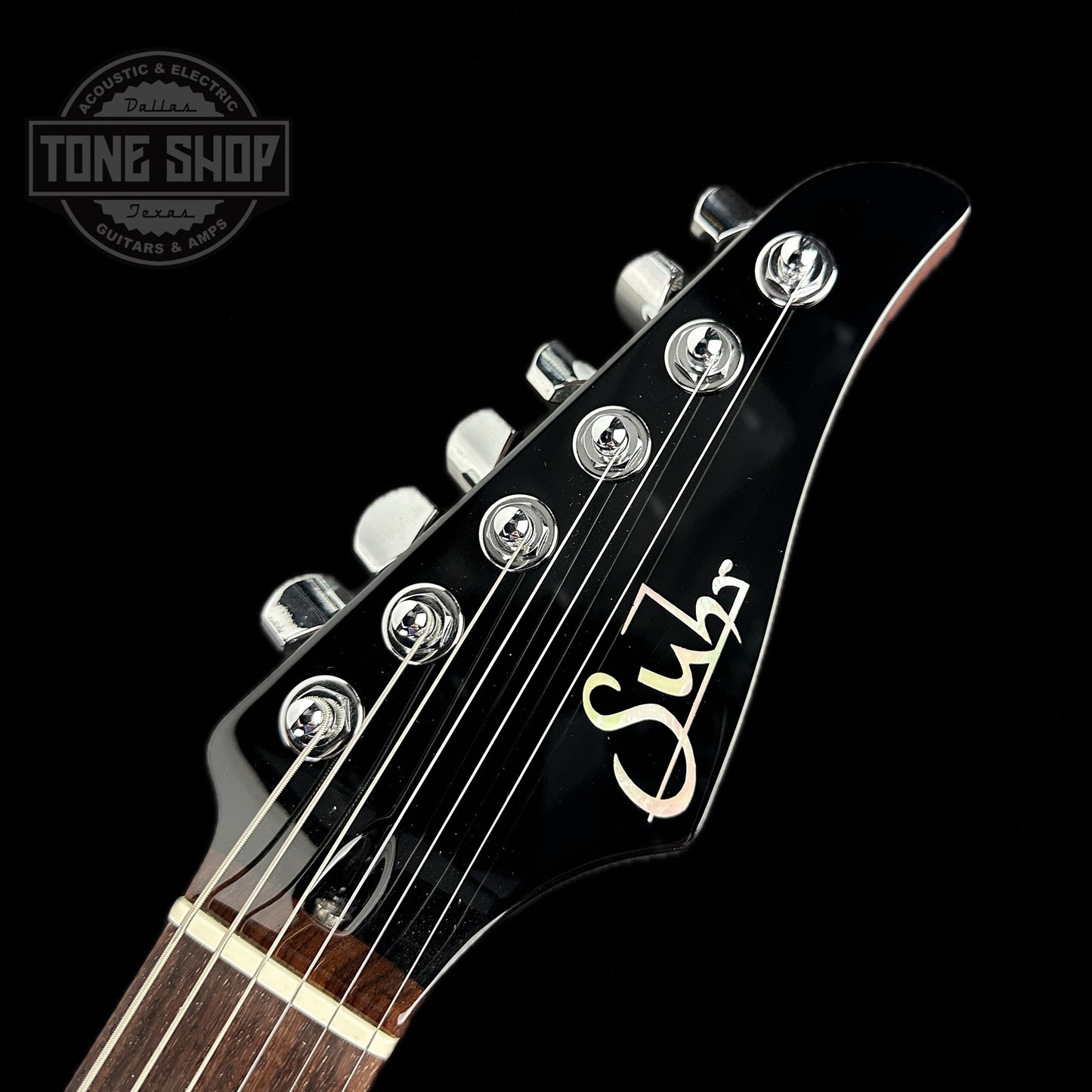 Front of headstock of Used Suhr Pete Thorn Signature Standard Vintage Gold.