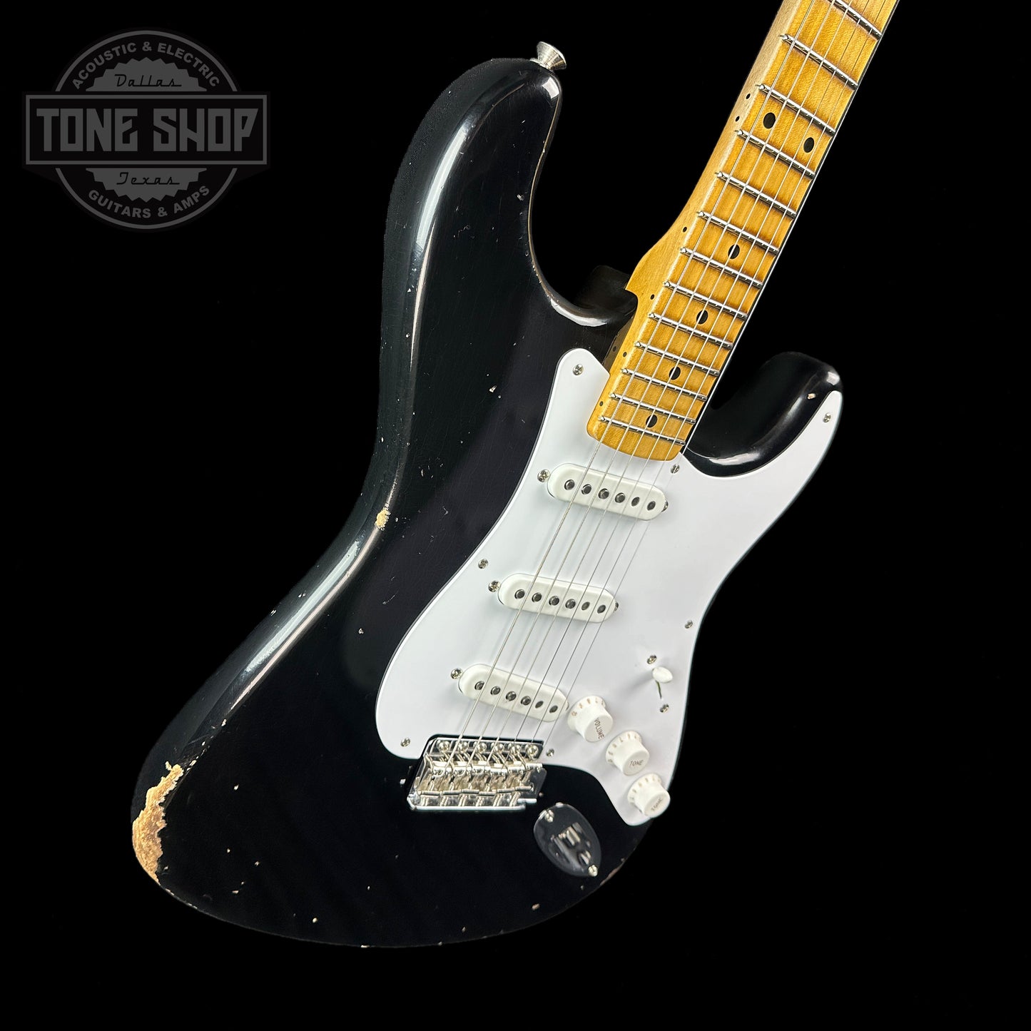 Front angle of Fender Custom Shop Limited Edition Fat '54 Strat Relic With Closet Classic Hardware Aged Black.