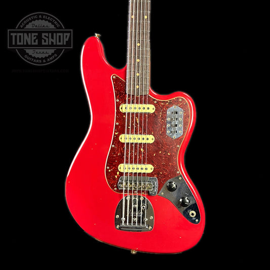 Front of body of Fender Custom Shop Limited Edition Bass VI Journeyman Relic Aged Dakota Red.