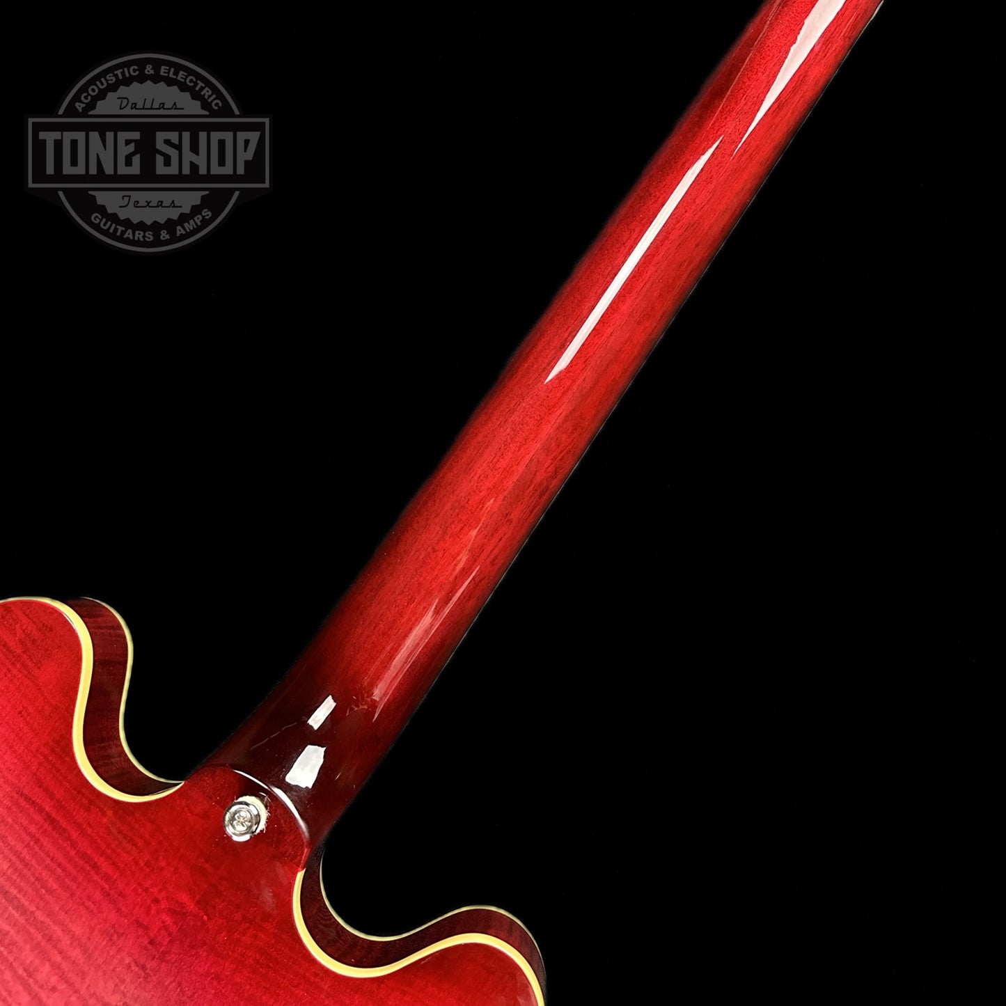 Back of neck of Used Epiphone ES-335 Figured Limited Raspberry Burst.