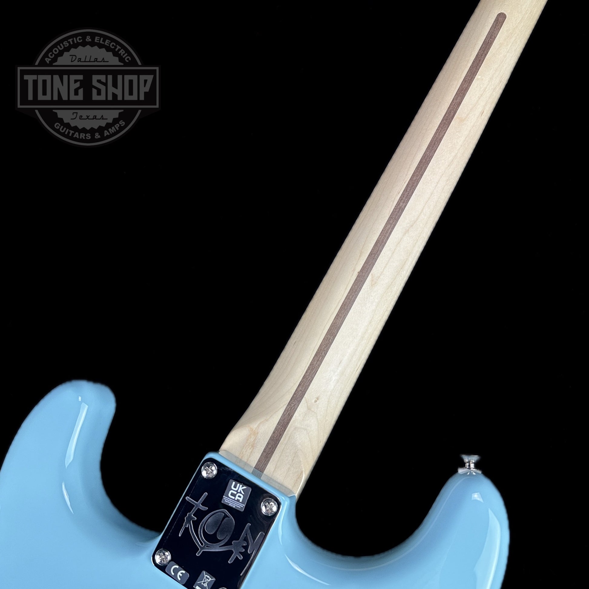 Back of neck of Used 2023 Fender Tom Delonge Stratocaster Daphne Blue.