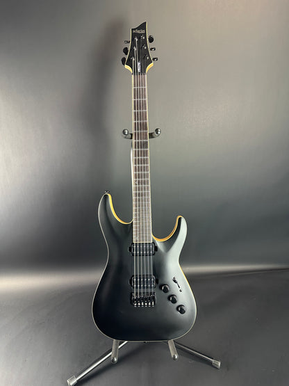 Full front of Used Schecter C-1 Apocalypse Carbon Black.