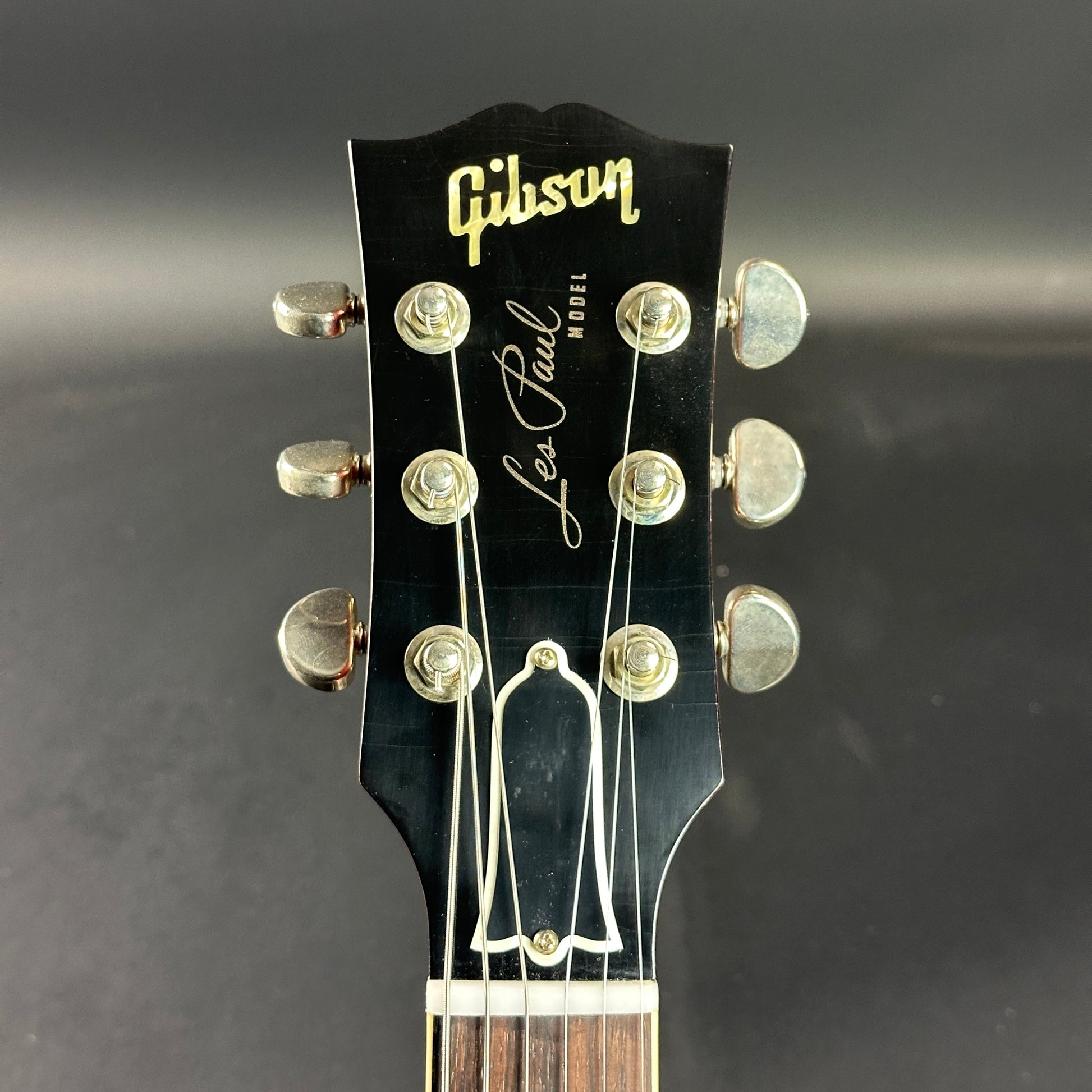 Front of headstock of Used Gibson Custom Shop M2M 1959 Les Paul Standard Reissue Chambered Golden Poppy Ultra Light Murphy Aged.