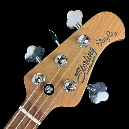 Front of headstock of Used Sterling Ray 34 Bass Blue Sparkle.