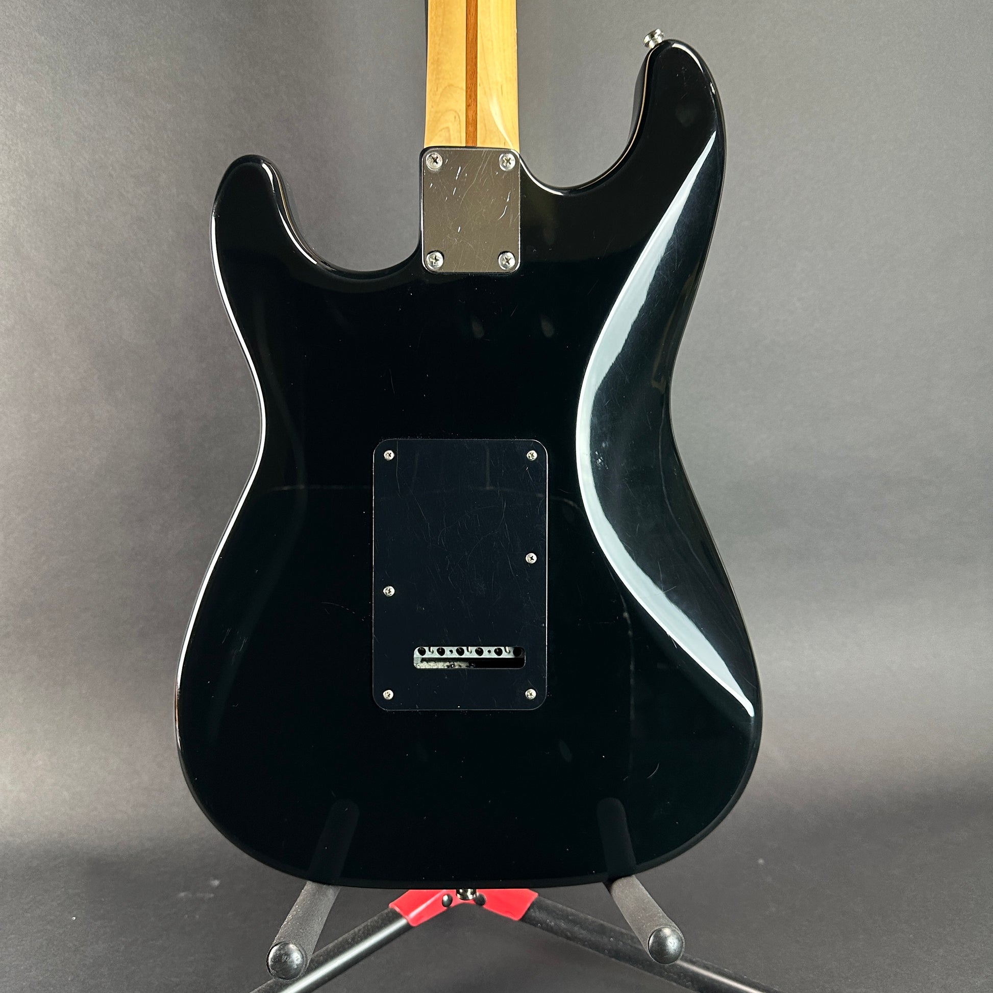 Back of body of Used Fender MIM Standard Strat Black.