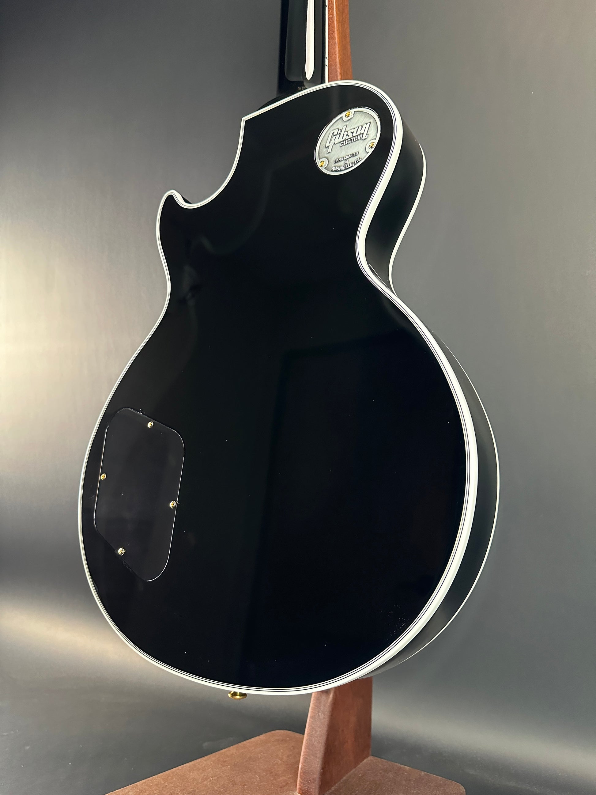 Back angle of Used Gibson Custom Shop Les Paul Custom Ebony.