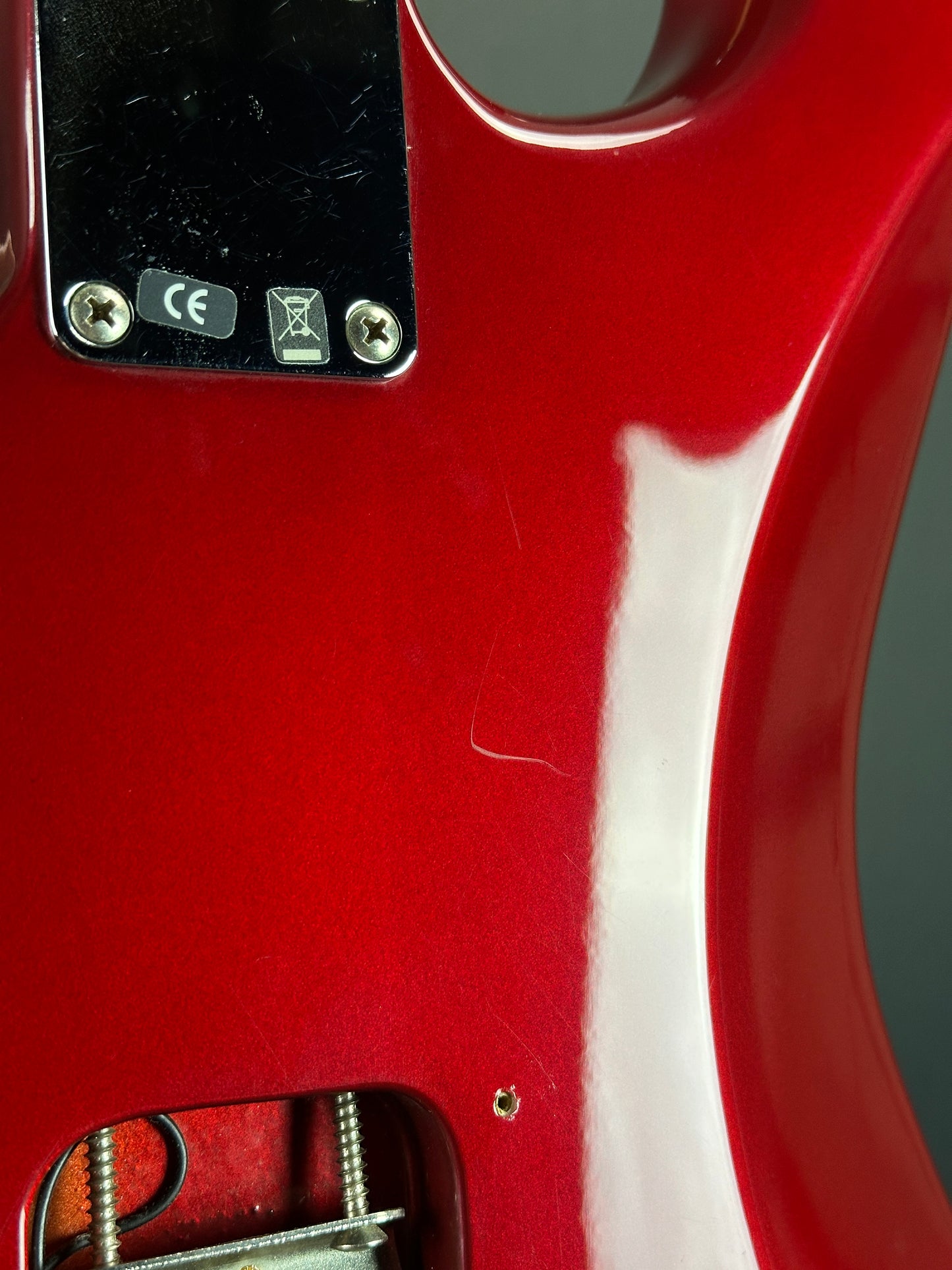 Scratch on back of Used 2006 Fender Sam Ash 48th Street Red Strat.