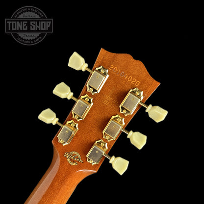 Back of headstock of Used Gibson Custom Shop M2M Hummingbird Original Adi Red Spruce Top.