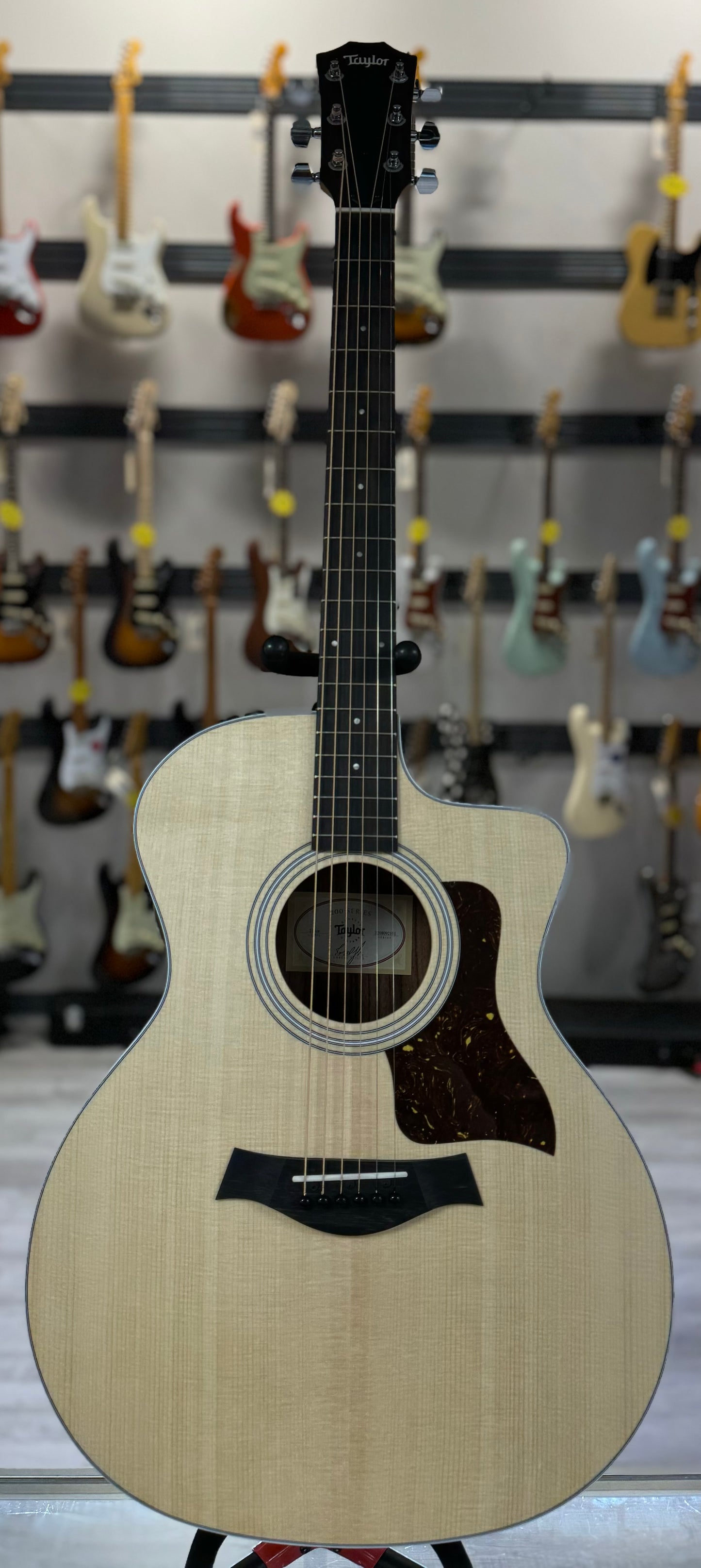 Full font of Used Taylor 214ce Natural w/bag