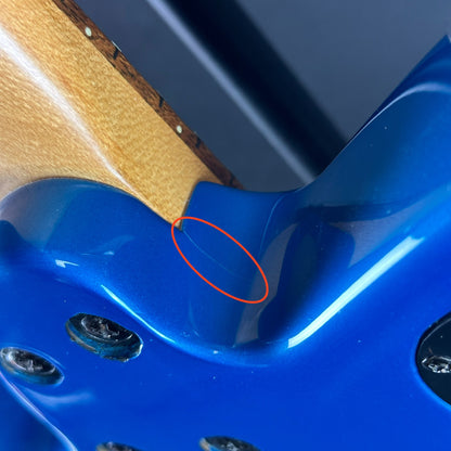 Finish crack near neck joint of Used Fender Tornado GT HH Blue.