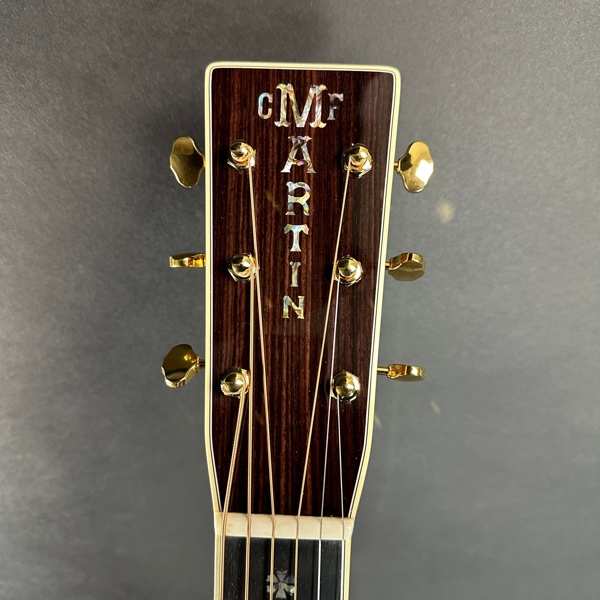 Front of headstock of Used Martin D-42 Natural.