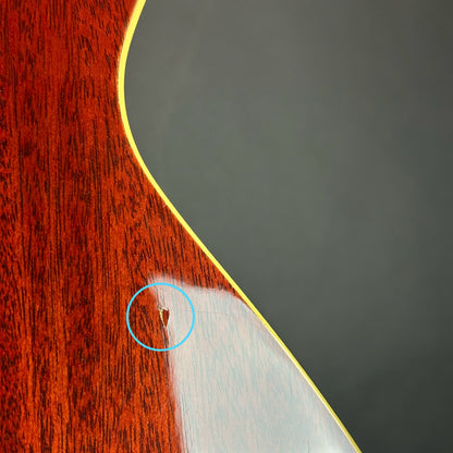 Ding on back of body of Used Takamine Santa Fe ESF40C.