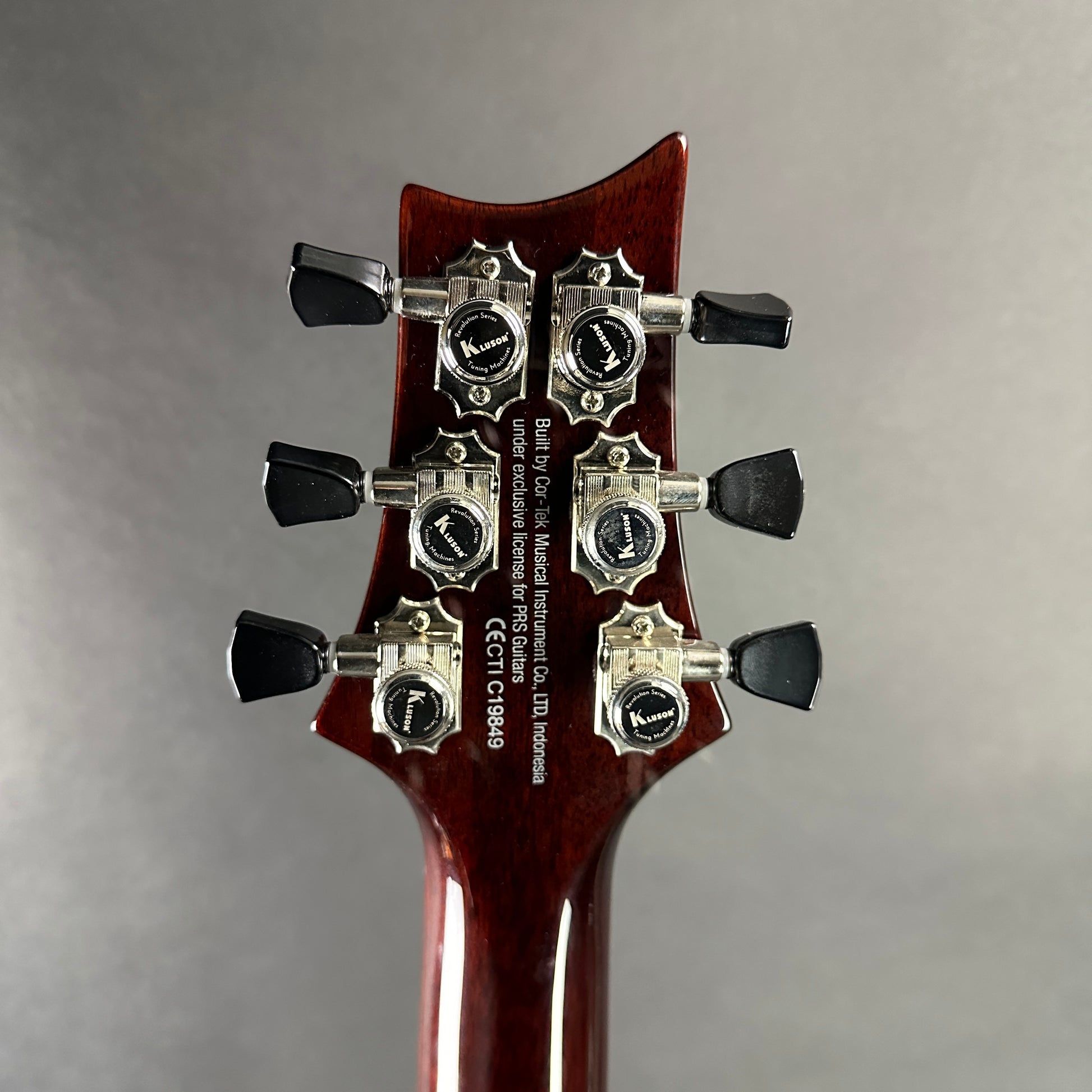 Back of headstock of Used PRS SE Paul's Guitar Red.