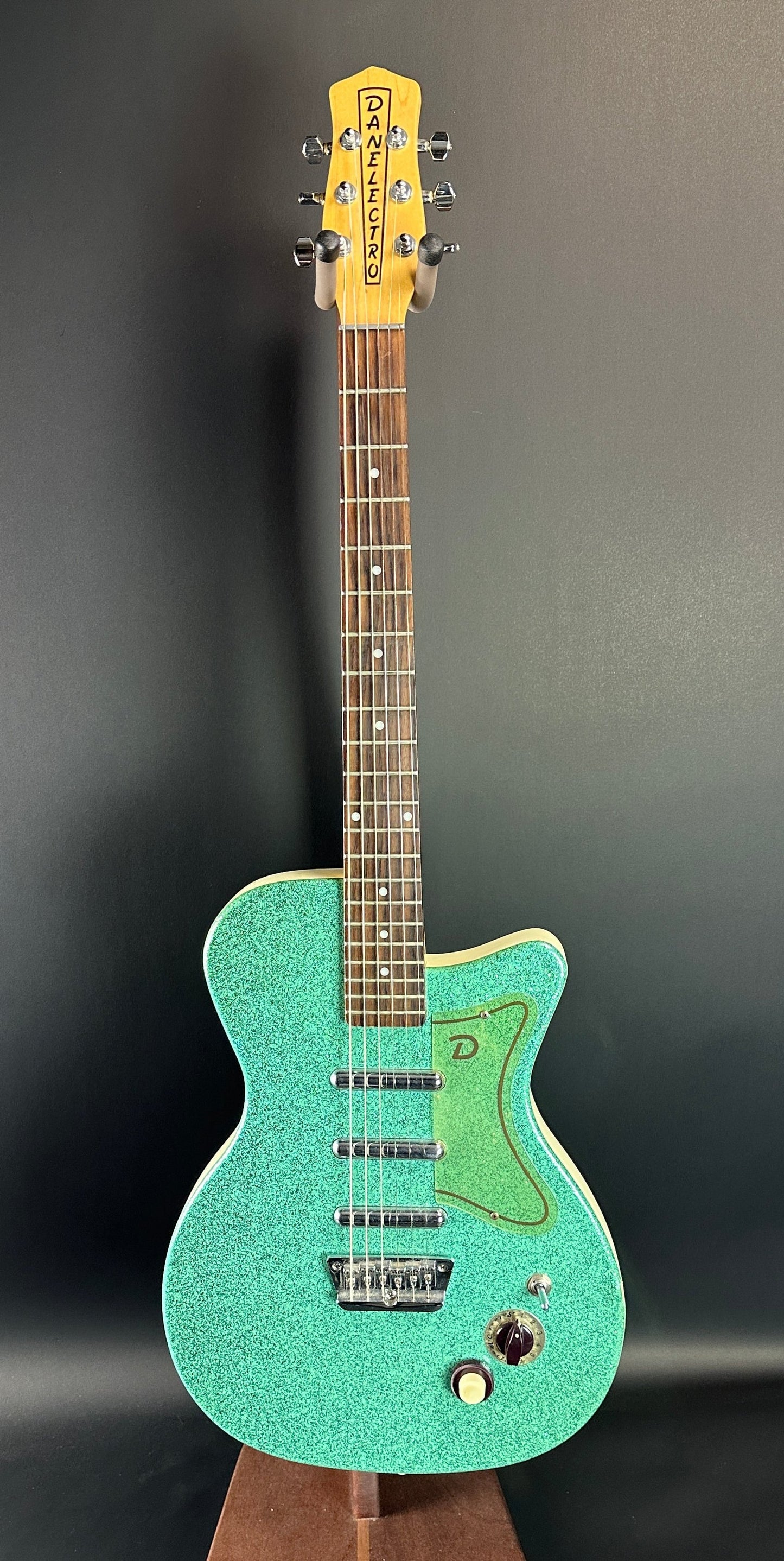 Full front of Used Danelectro '56 U3 Green Sparkle.