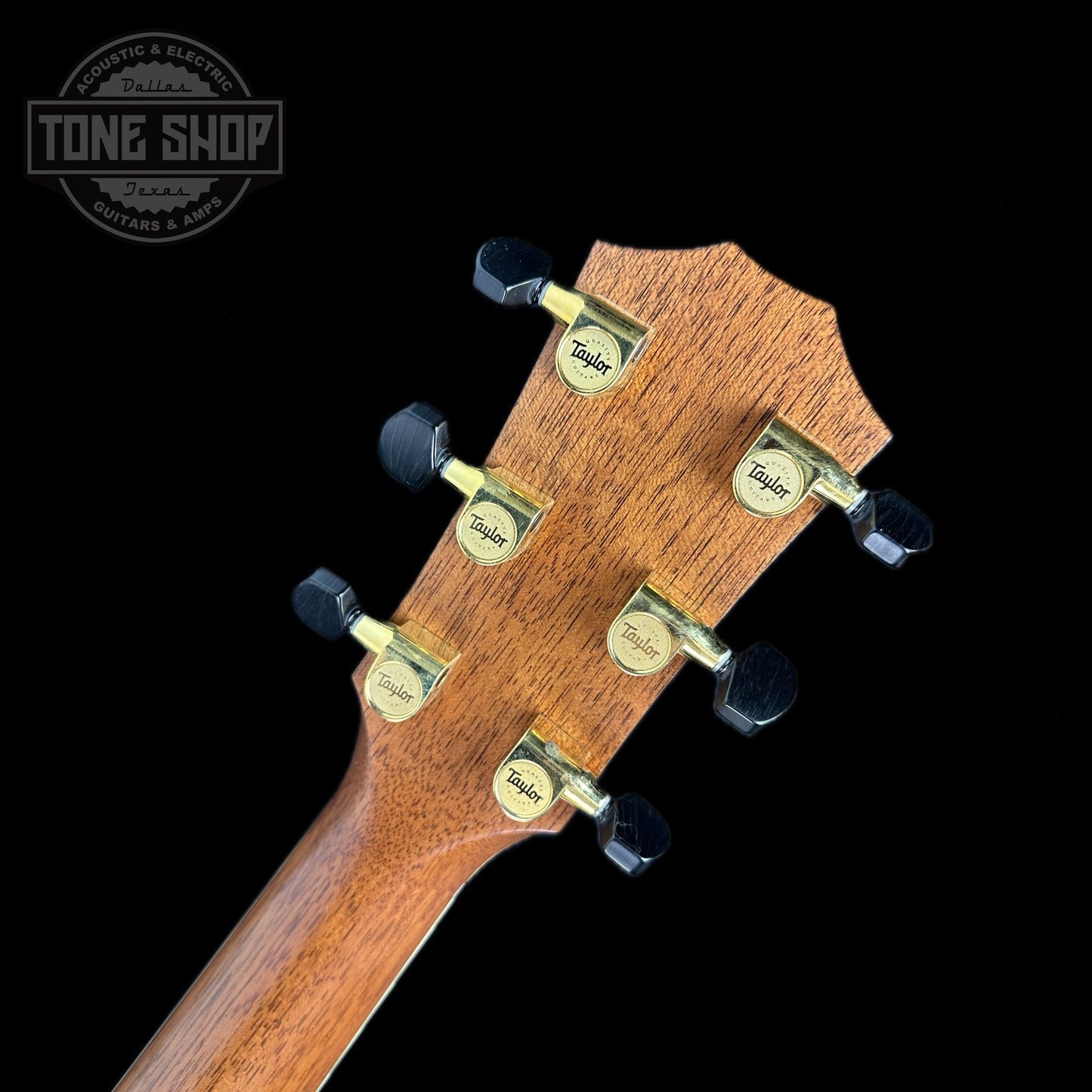 Back of headstock of Used Taylor 915ce Natural.