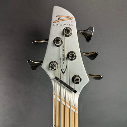 Front of headstock of Used Dingwall Adam "Nolly" Getgood Signature 5 String Combustion Bass.