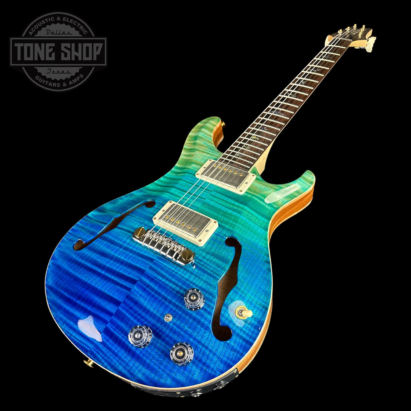 Front angle of PRS Wood Library Hollowbody II Piezo 10-top Blue Fade Maple Neck.