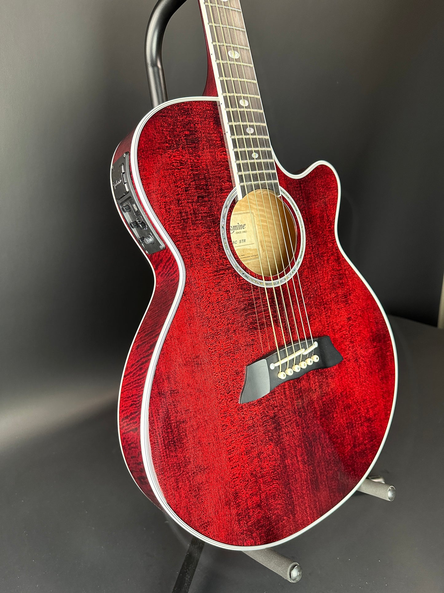 Front angle of Used Takamine TSP158C Red.