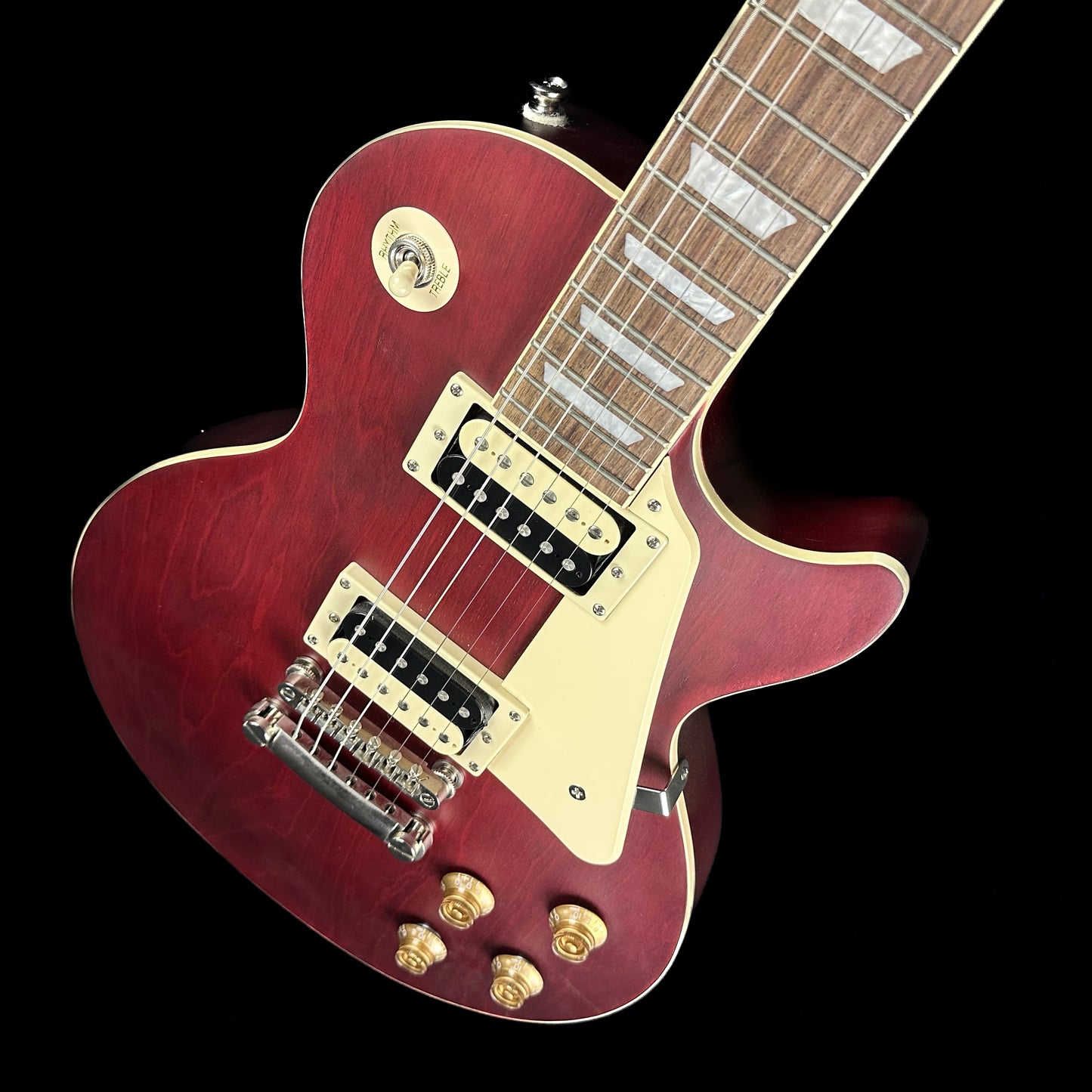 Front angle of Used Epiphone Traditional Pro IV Les Paul Worn Wine Red.