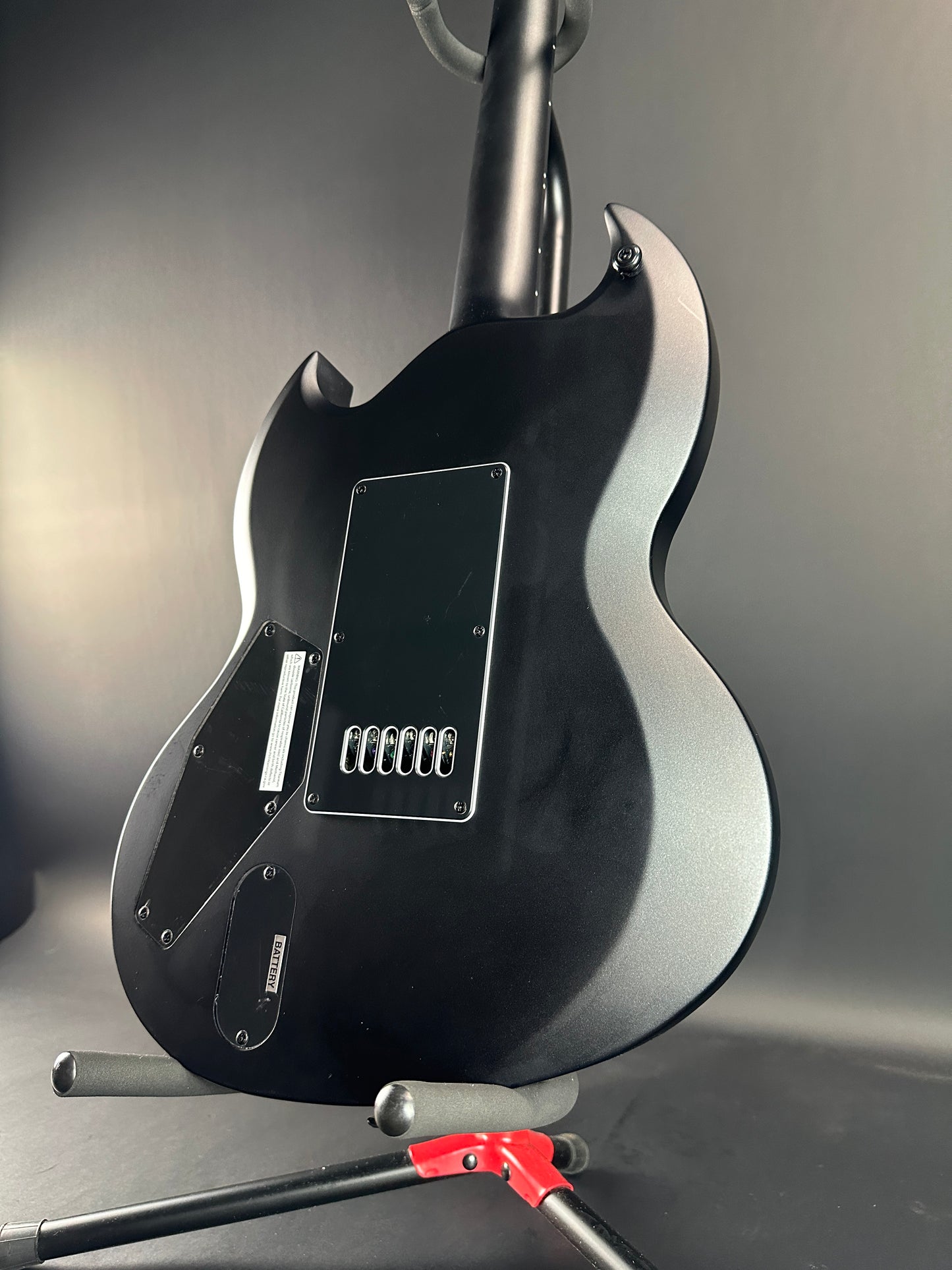 Back angle of Used ESP LTD Viper 1000 Deluxe Satin Black.