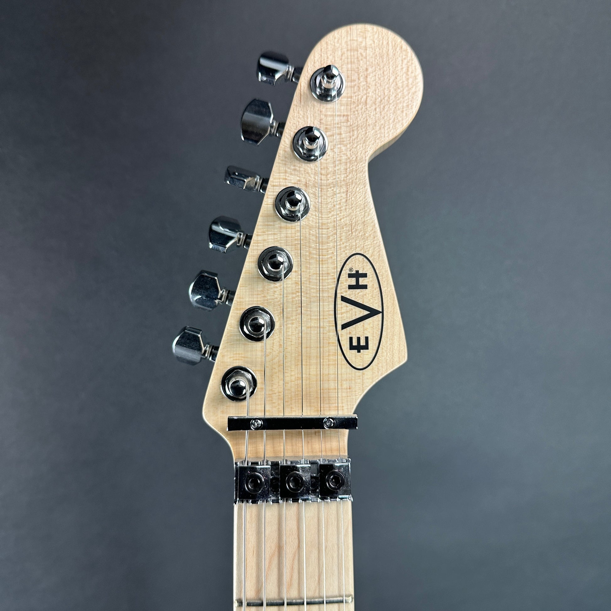 Front of headstock of Used EVH Striped Series Black & Yellow.