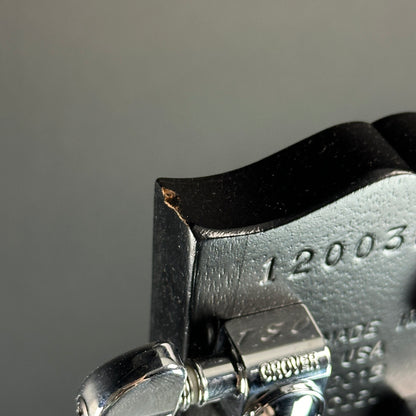 Chip on top of headstock of Used Gibson SG 70's Tribute Black.