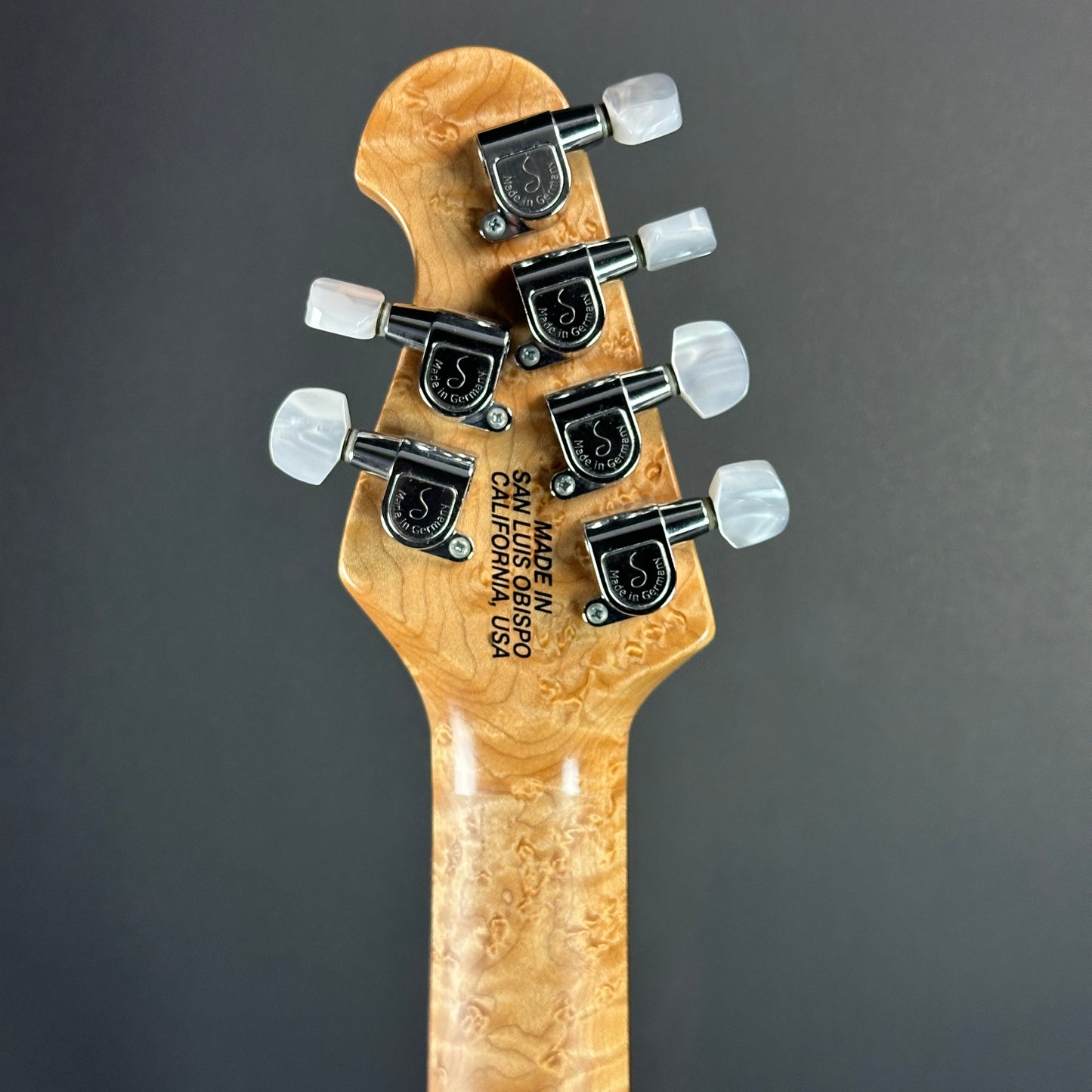 Back of headstock of Used Ernie Ball MusicMan Axis HH Floyd.