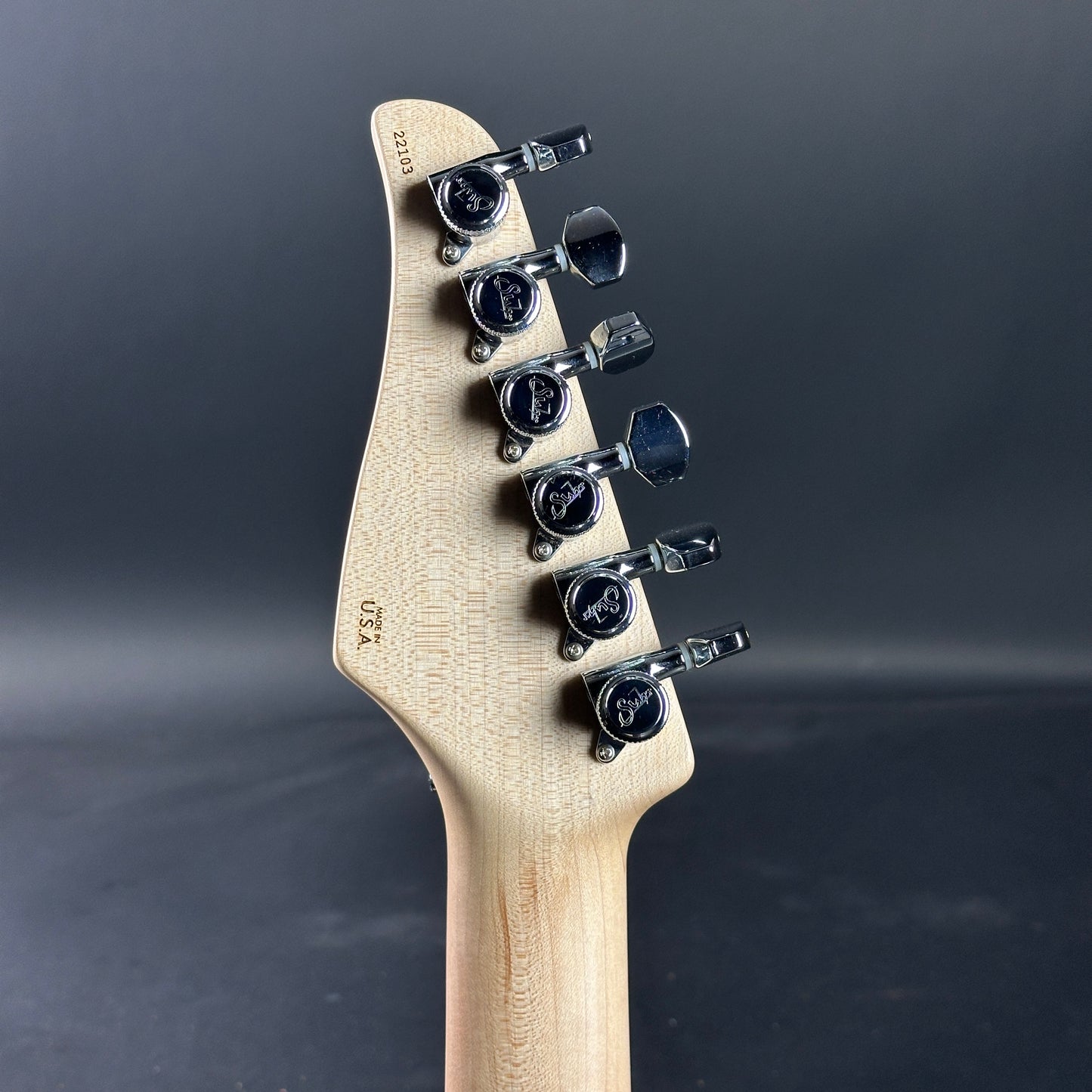 Back of headstock of Used 2015 Suhr Modern Pro Flame Top HSH Floyd Rose.