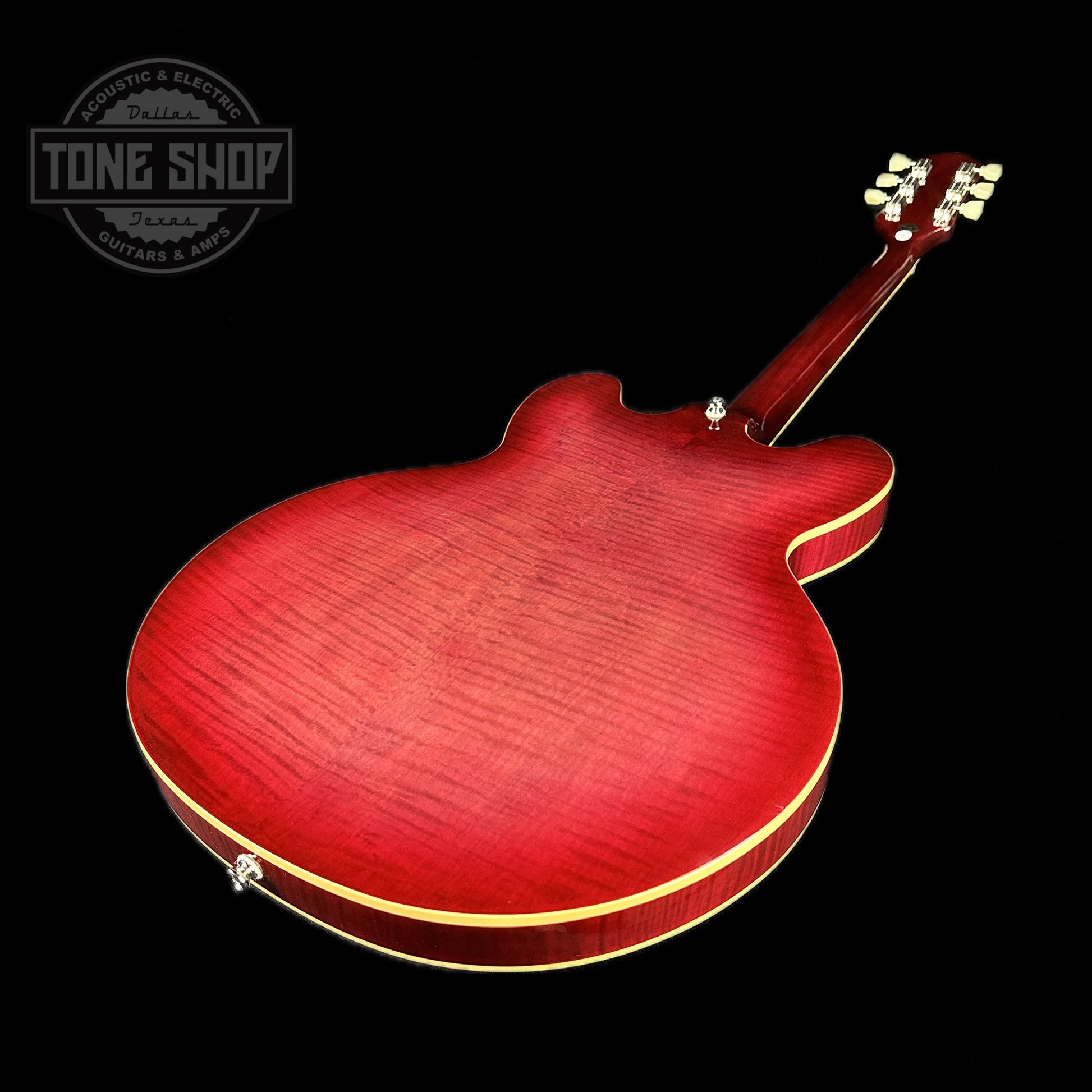 Back angle of Used Epiphone ES-335 Figured Limited Raspberry Burst.