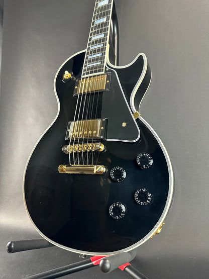 Front angle of Used Gibson Les Paul Custom Ebony.