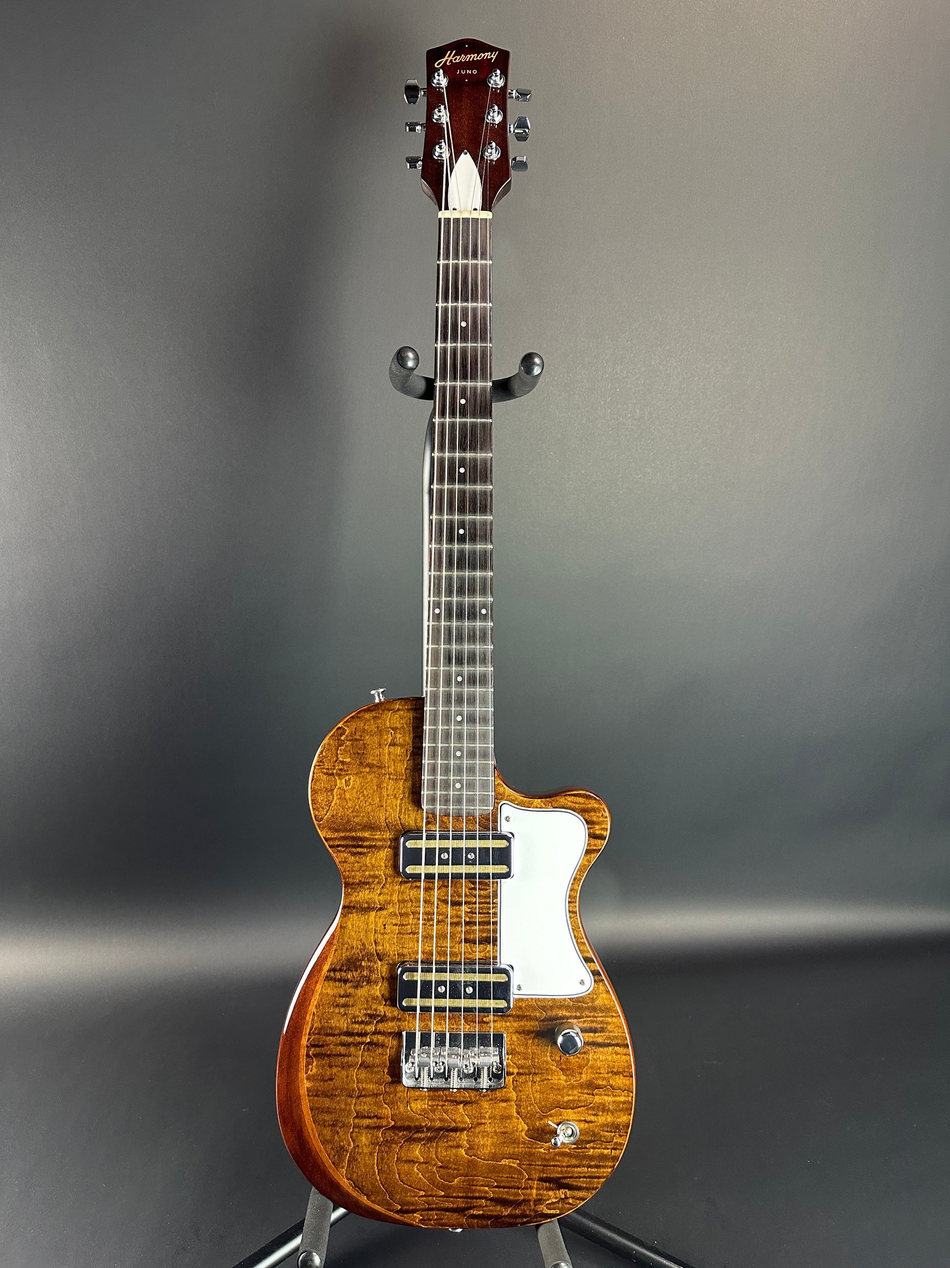 Full front of Used Harmony Juno Transparent Brown Flame Maple.